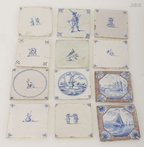 A lot with (12) earthenware tiles with various motifs, 18th & 19th century.