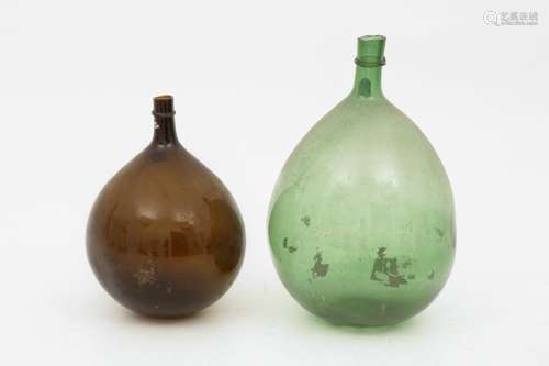 A set of (2) large green balloon-/ fermantation bottles, Germany, 20th century.