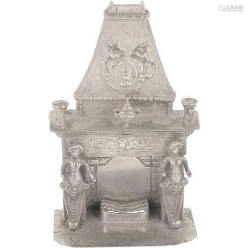 Miniature fireplace silver.