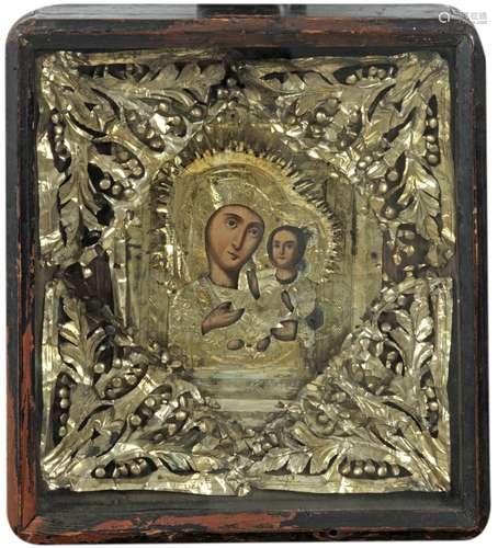 An icon of mother and child, decorated with leaf-white metal.