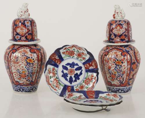 (2) Imari vases and (3) plates. Japan, 19th century.