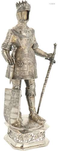 German king in silver battle armor.