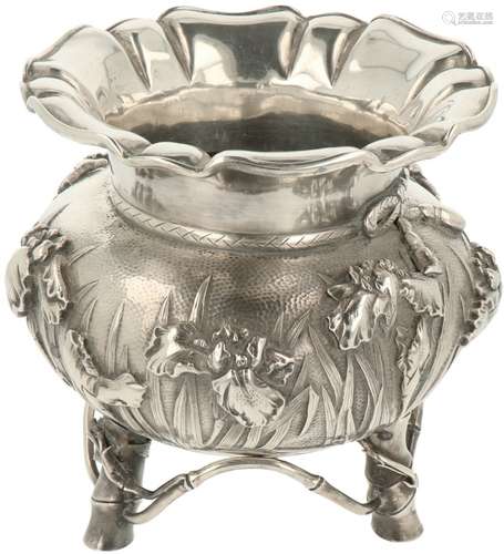 Chinese vase on a silver base.