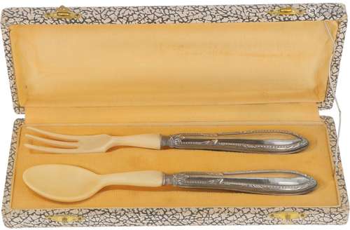 (2) Piece silver cutlery set.