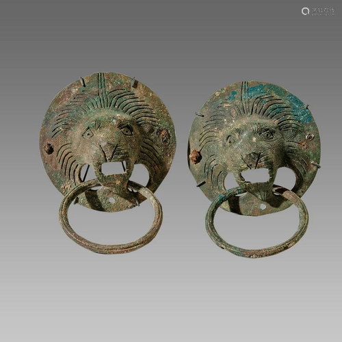 A pair of ancient Roman Bronze Lion Head Handles c.2nd