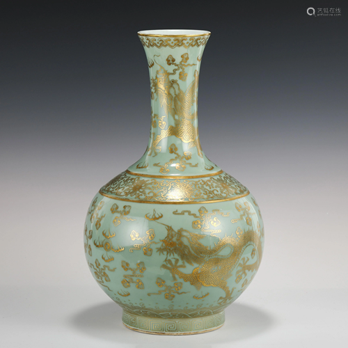 CELADON GLAZED GILT OVERGLAZED DETAIL DRAGON MOTI…