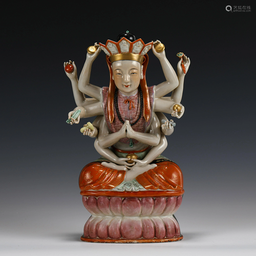 FAMILLE ROSE TWELVE ARMED PORCELAIN BUDDHA