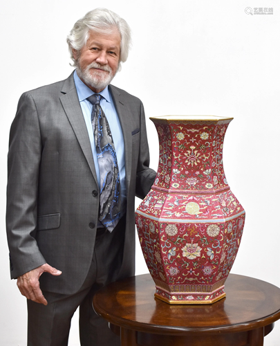 FAMILLE ROSE FLORAL MOTIF ON IRON RED HEXAGONAL VASE