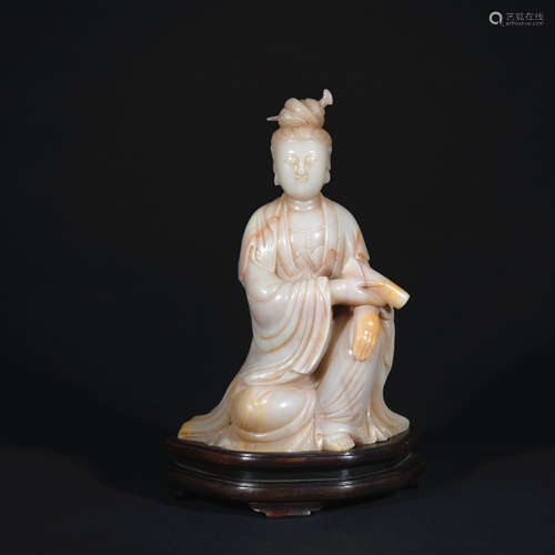 A shou shan stone statue of Guan Yin