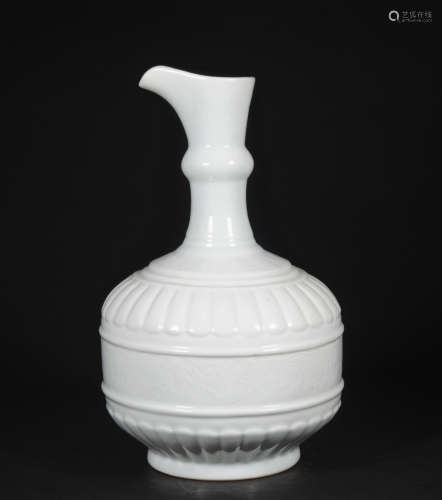 A white glazed 'floral' vase