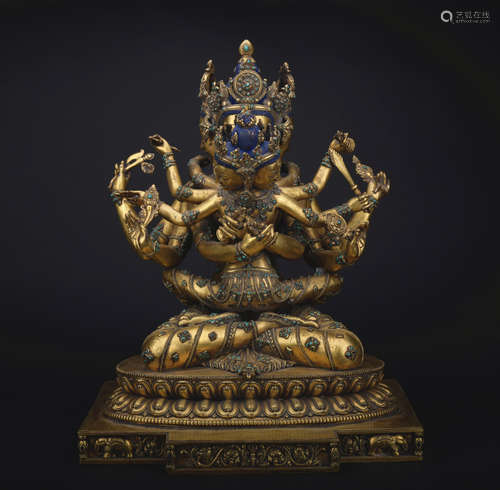 A gilt-bronze statue of Guhyasamaja