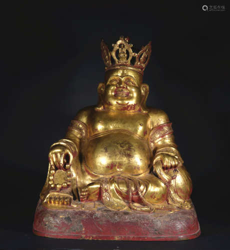 A gilt-bronze statue of Maitreya
