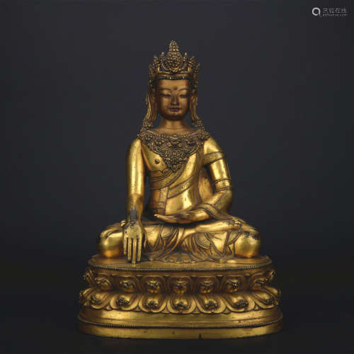 A gilt-bronze statue of Sakyamumi