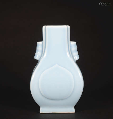 A celadon-glazed vase