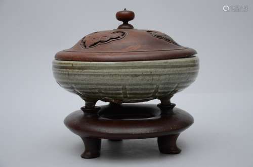 A Celadon incense burner on a wooden base, Ming period (dia 27cm) (*)