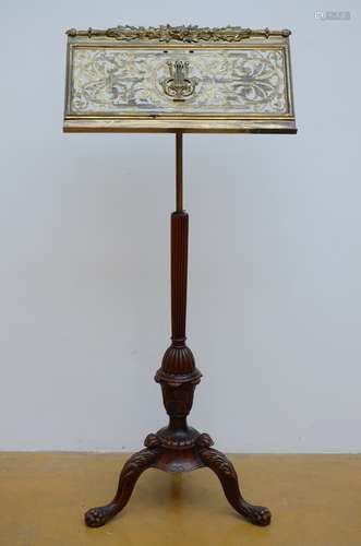 A music stand on an mahogany base (h144cm)