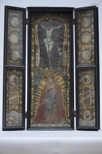 A triptych reliquairy with wax and textile fragments, 17th - 18th century (open 66x50 cm)