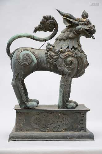 A Nepalese temple guard in copper repoussé 'lion' (90x57x39 cm)