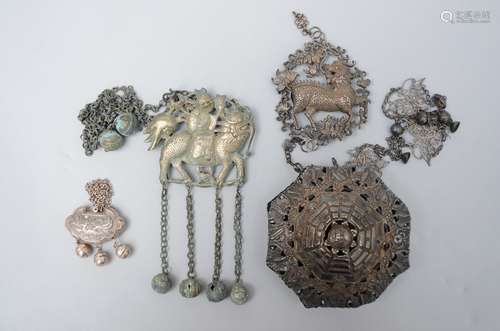 Lot: three Chinese silver pendants