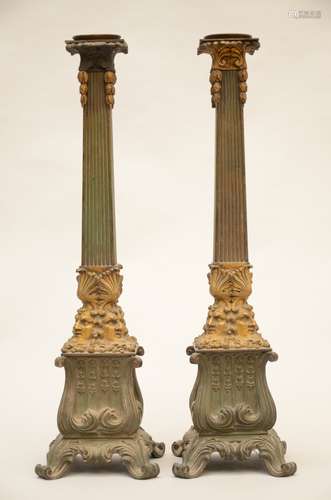 A pair of bronze candlesticks with heads, 19th century (58 cm)