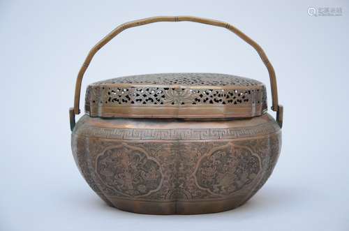 A Chinese bronze hand warmer (12x21x16 cm)