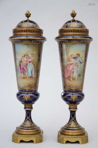 A pair of lidded vases in Sèvres porcelain painted by Grisard 'romantic scenes' (50cm)