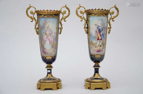 A pair of vases in Sèvres porcelain 'galant couple' (35cm) (*)