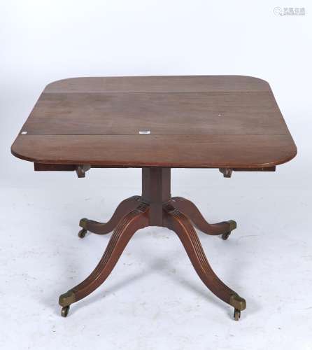 A VICTORIAN MAHOGANY TABLE, C1840, THE DROP LEAF TOP ON OCTAGONAL PILLAR AND QUADRUPLE REEDED LEGS