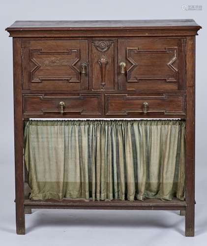 A JACOBEAN REVIVAL OAK CUPBOARD, C1920, THE RECTANGULAR TOP ABOVE A PAIR OF CUPBOARDS WITH APPLIED