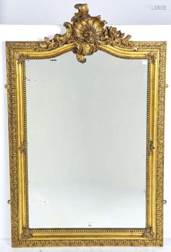 A FRENCH GILTWOOD AND COMPOSITION MIRROR, LATE 19TH C, THE MOULDED RECTANGULAR FRAME WITH ARCHED TOP