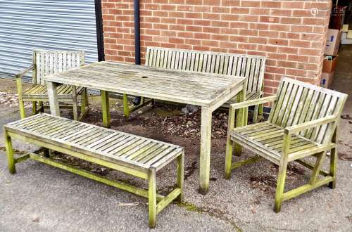 A TEAK SLATTED GARDEN TABLE ON SQUARE LEGS, 160X 85CM; TOGETHER WITH A TEAK SLATTED BENCH WITH H-