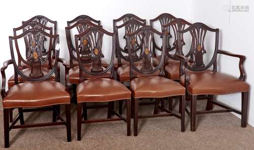 A SET OF TWELVE VICTORIAN MAHOGANY DINING CHAIRS, LATE 19TH C, THE STUFFED OVER SEATS COVERED IN
