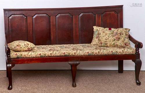A GEORGE III OAK SETTLE, LATE 18TH C, THE RAKED BACK WITH FIVE RAISED AND FIELDED OGEE PANELS,