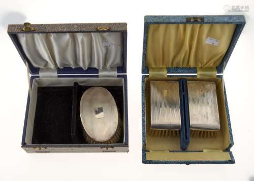 ONE AND A PAIR OF SILVER GENTLEMAN'S BRUSHES, BY DIFFERENT MAKERS, 1952 AND CIRCA (2 CASES)