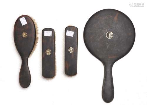 A TORTOISESHELL BRUSH AND MIRROR SET AND A SILVER HANDLED PAGE TURNER Condition report