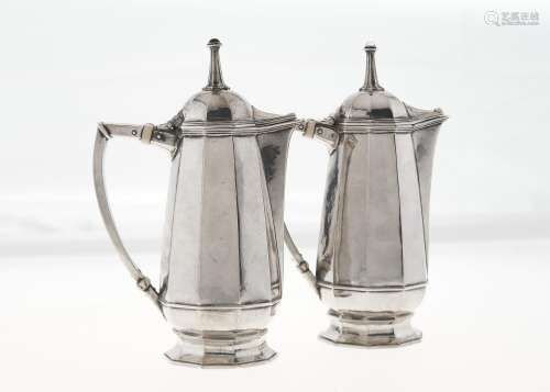 OMAR RAMSDEN. A PAIR OF ARTS AND CRAFTS JEWELLED SILVER CAFE AU LAIT POTS, OF DECAGONAL SECTION,
