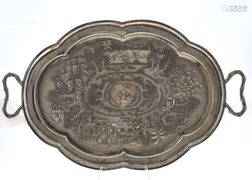 AN INDIAN SILVER REPOUSEE TEA TRAY, CALCUTTA (KOLKATA) C1900, CRISPLY CHASED WITH A CONTINUOUS SCENE
