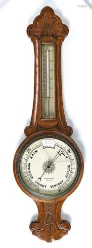 A CARVED OAK ANEROID BAROMETER, C1910, DYSON & SONS, LEEDS, WITH MERCURY THERMOMETER, 84CM H