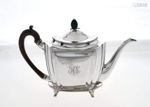 A GEORGE III SILVER TEAPOT AND STAND, THE DOMED LID WITH INTEGRAL HINGE AND GREEN STAINED IVORY