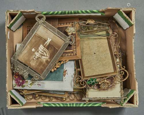 ELEVEN FIN DE SIECLE AND EARLY 20TH C DECORATIVE BRASS PHOTOGRAPH FRAMES, MAINLY FRENCH OR GERMAN