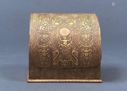 A PARCEL GILT AND EMBOSSED TAN LEATHER STATIONERY BOX, C1930, DECORATED WITH GROTESQUES, THE