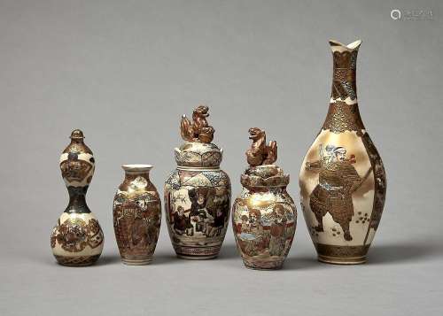 A SATSUMA EARTHENWARE DOUBLE GOURD BOTTLE AND STOPPER, MEIJI PERIOD, DECORATED IN TWO REGISTERS WITH