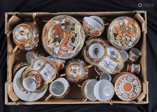 A KUTANI PORCELAIN COFFEE SET, PAIR OF CUP PLATES AND CUPS AND AN EXTENSIVE SAMURAI DECORATED