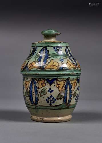 A MULTAN EARTHENWARE JAR AND COVER, SINDH, 19TH/20TH C, PAINTED IN BLUE, GREEN AND OCHRE WITH