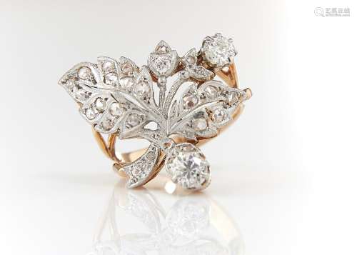 A DIAMOND RING, DESIGNED AS TWO LEAVES, MILLEGRAIN SET IN GOLD, UNMARKED, 6.5G, SIZE N Condition