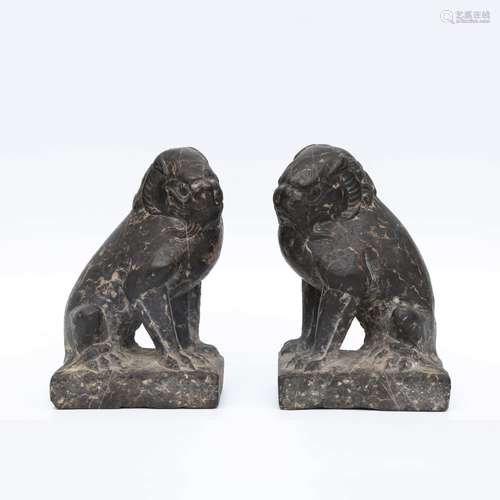 A Pair of Stone Carved Lion Ornaments