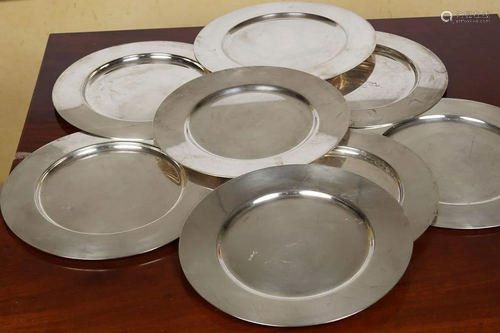 GROUP OF SILVER-PLATED SOUS PLATS