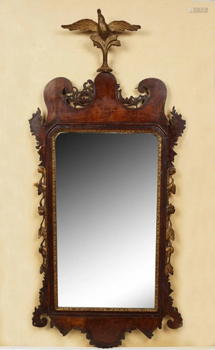 GEORGE II WALNUT AND PARCEL GILT MIRROR