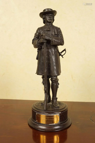 A BRONZE TROPHY PILGRIM FIGURE