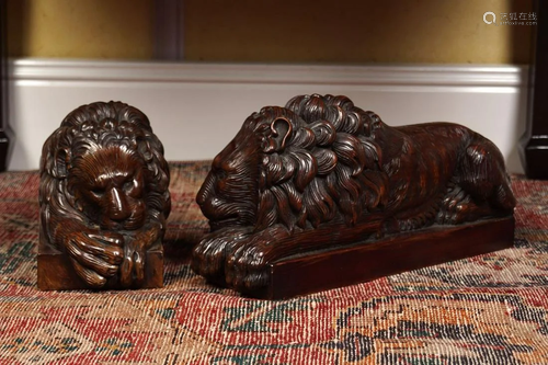 PAIR OF 19TH-CENTURY CARVED WOOD LIONS